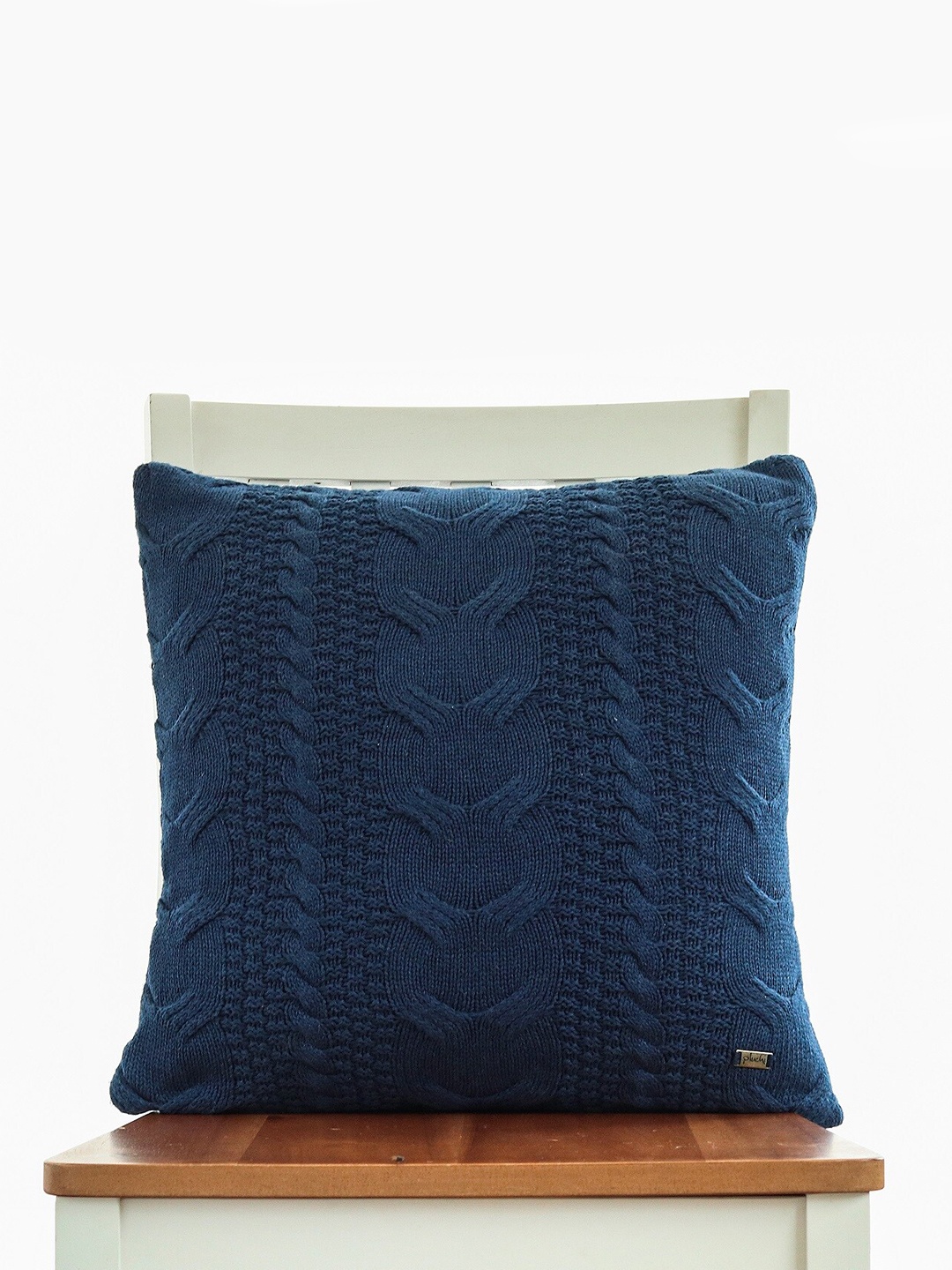 

Pluchi Navy Blue Self Design Cotton Square Cushion Cover