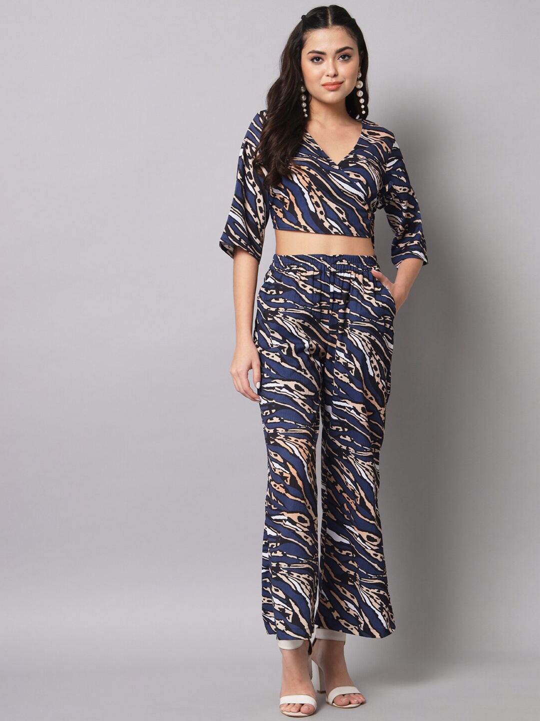 

The Vanca Navy Blue Printed Top & Palazzos Co-Ords Set