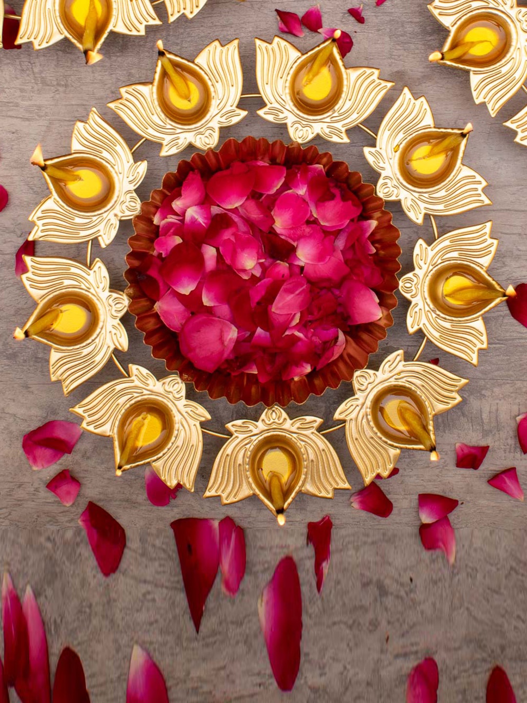

StatueStudio Gold Toned Flower Shaped Metal Urli Decorative Bowl