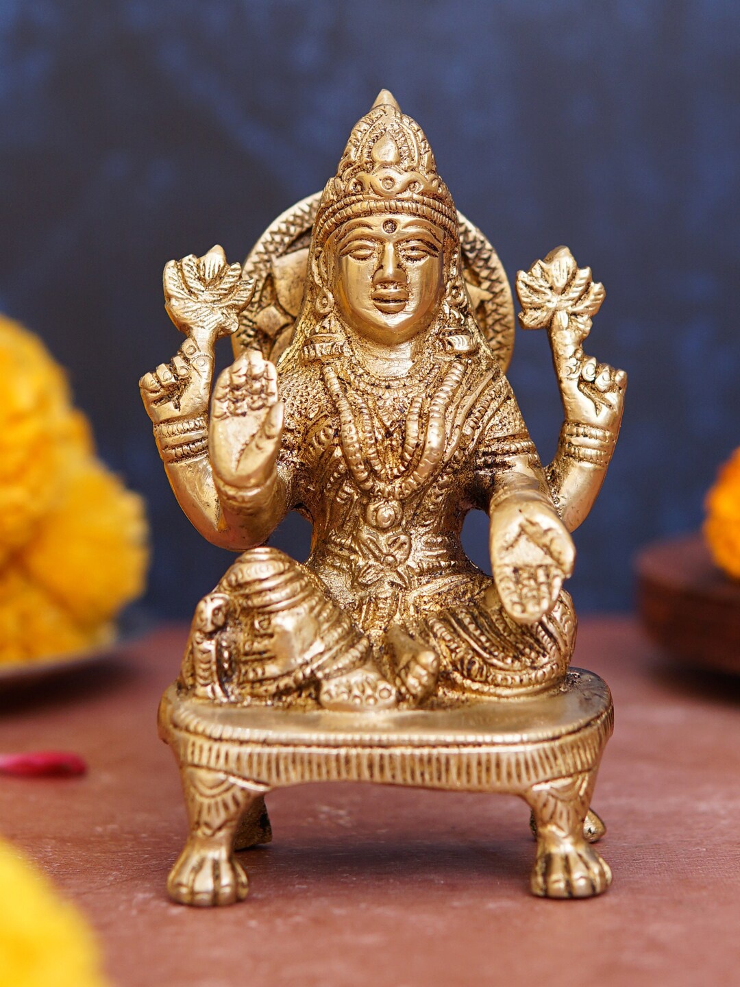 

StatueStudio Gold-Toned Textured Laxmi Idol Sitting On Pooja Chowki Showpiece