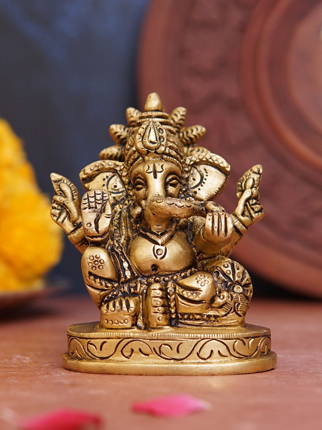 

StatueStudio Gold-Toned Textured Ganesha Figurine Showpiece