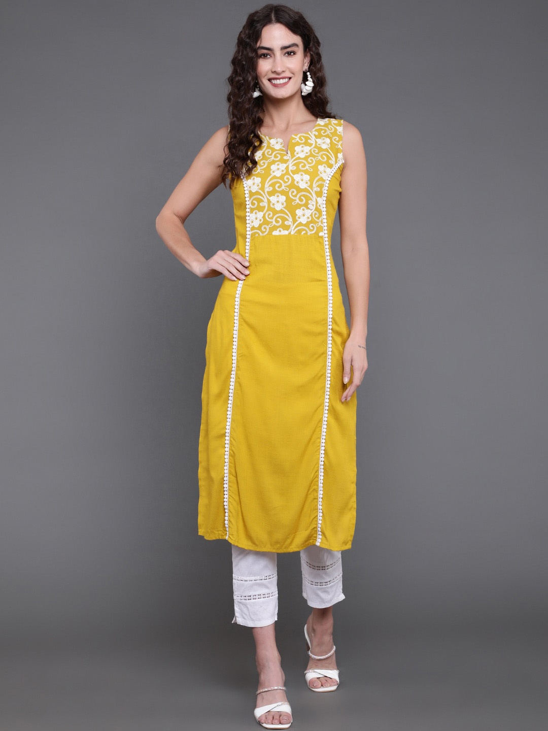 

antaran Floral Yoke Design Notched Neck Thread Work Kurta, Yellow