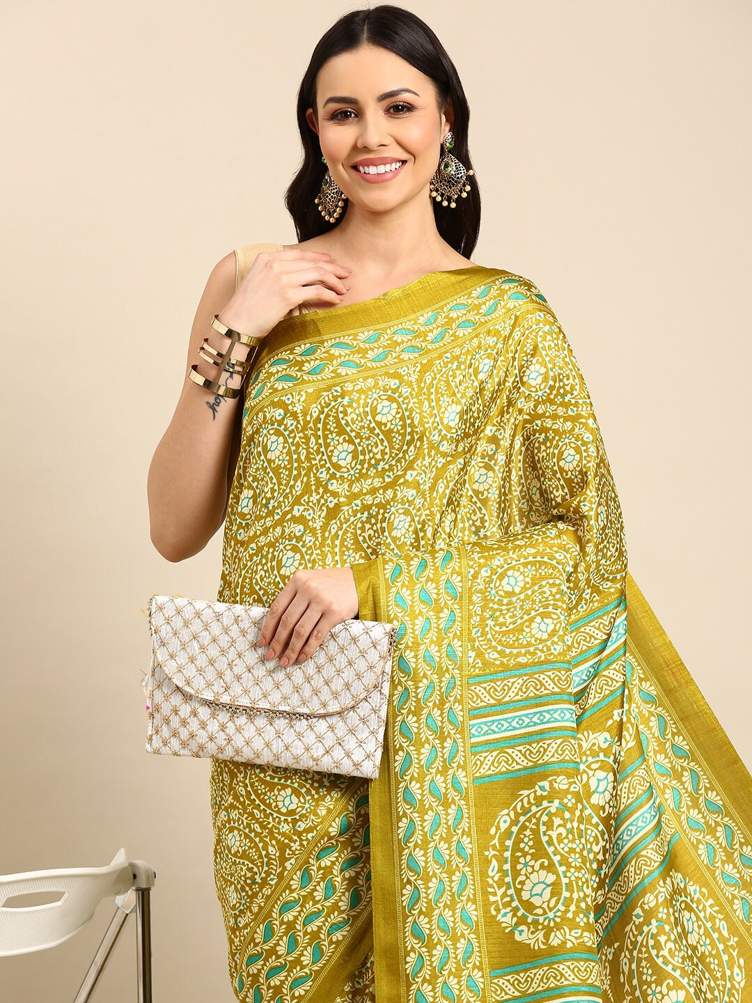 

Anouk Lime Green & White Ethnic Motifs Printed Saree