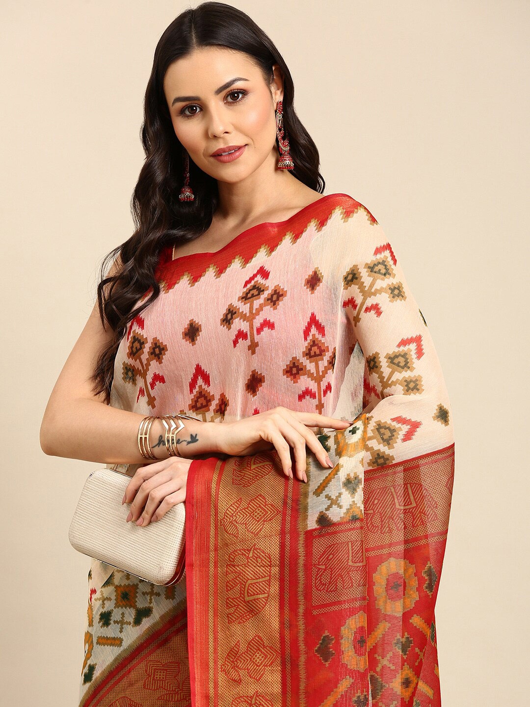 

Anouk White & Red Ethnic Motifs Zari Pure Cotton Patola Saree
