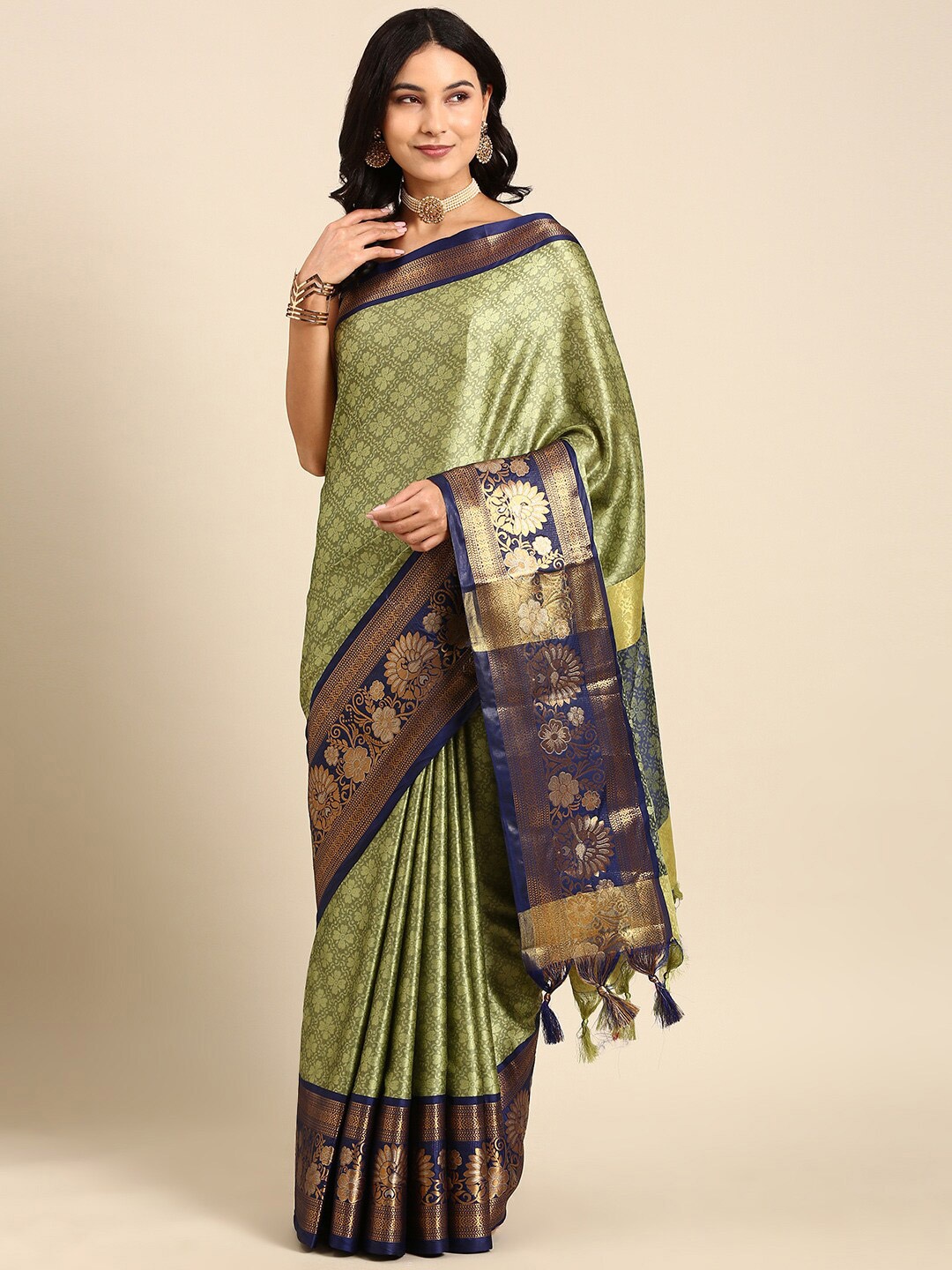 

Anouk Green & Black Floral Woven Design Zari Kanjeevaram Saree
