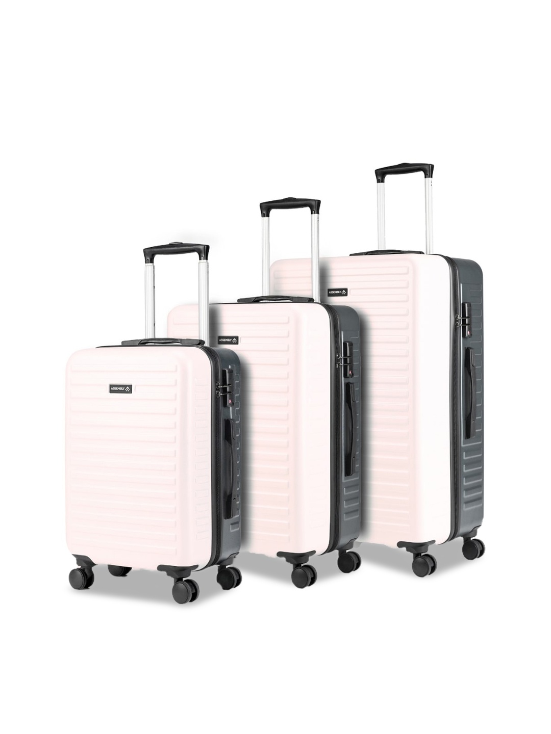 

Assembly Two Toned Hard-Sided Polycarbonate Trolley Bag - Ivory & Grey (20,24 & 28 Inches), Pink