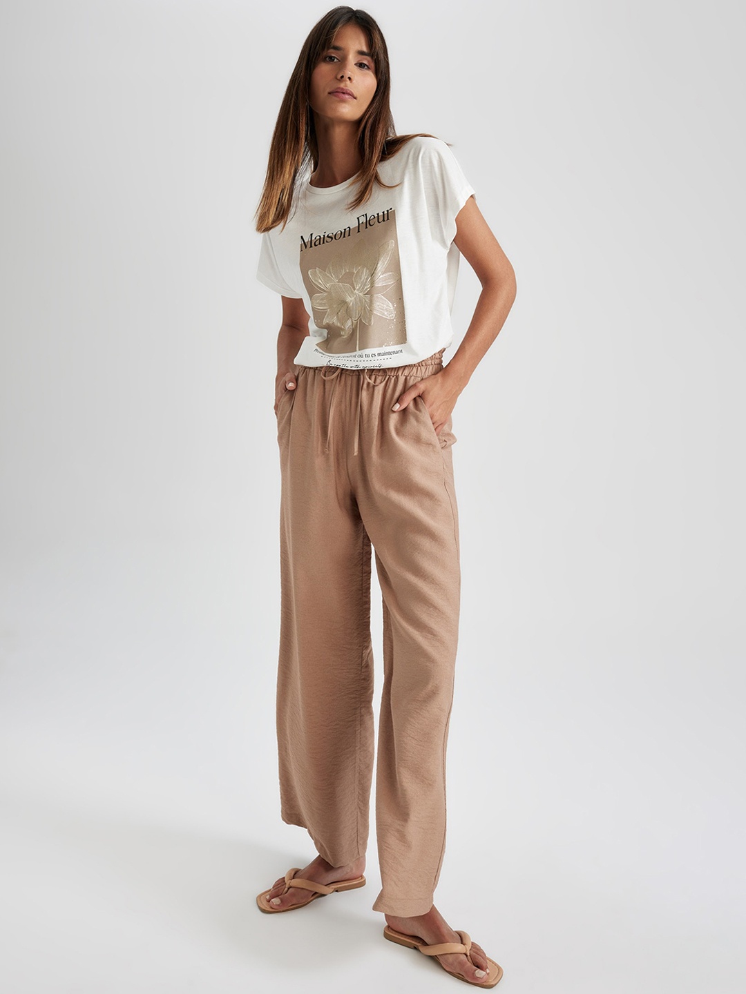 

DeFacto Women Mid Rise Flared Parallel Trousers, Beige