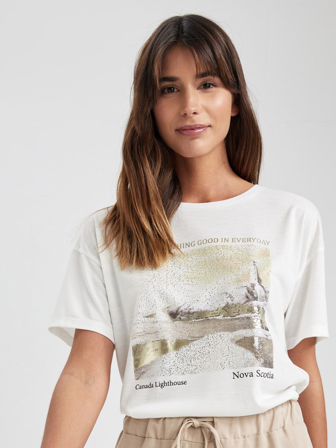 

DeFacto Graphic Printed Drop Shoulder Sleeves T-shirt, Off white