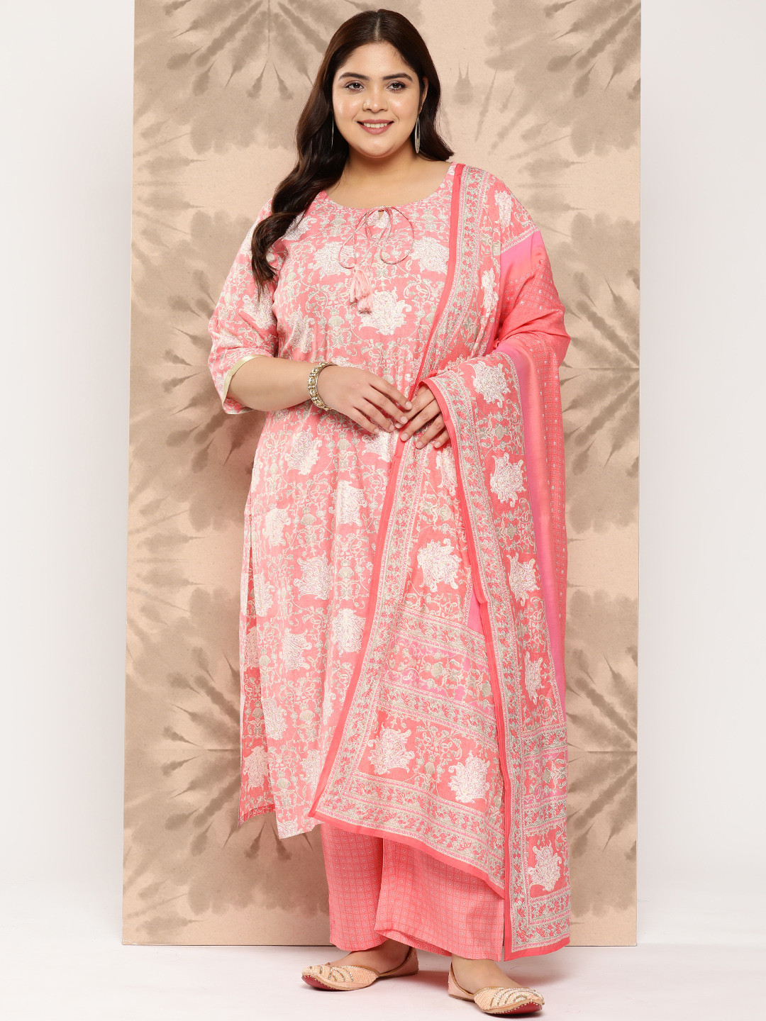 

EXTRA LOVE BY LIBAS Floral Printed Regular Kurta with Trousers & With Dupatta, Peach