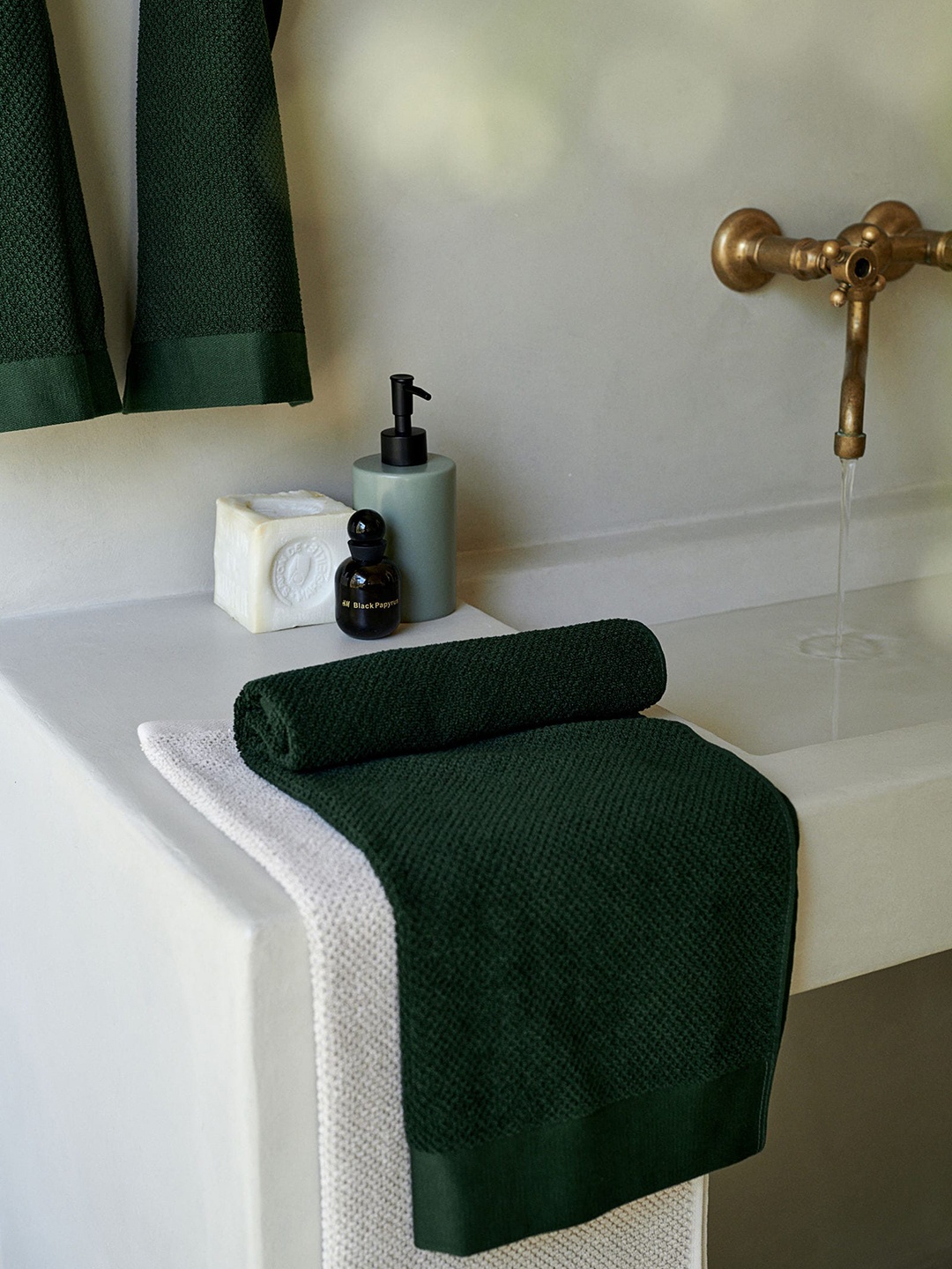 

H&M Green Earthenware Soap Dispenser