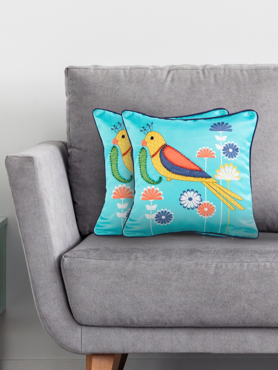 

Home Centre Aurora Teal & Orange 2-Pieces Graphic Square Cushion Covers