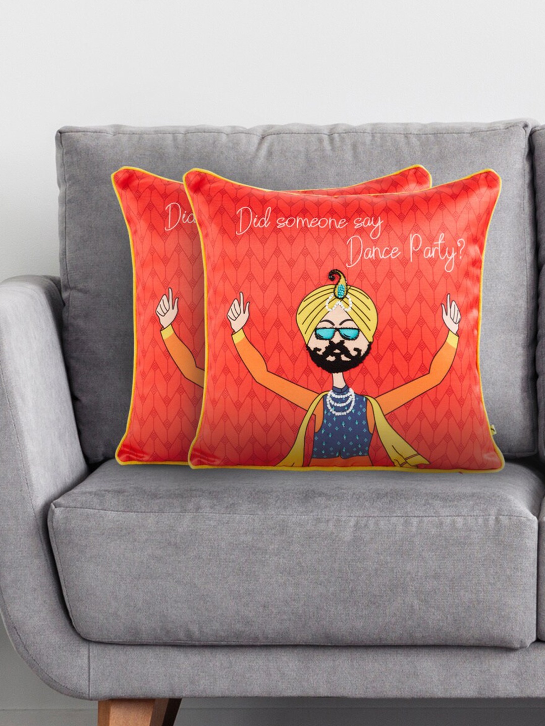 

Home Centre Aurora Orange & Blue 2-Pieces Graphic Square Cushion Covers