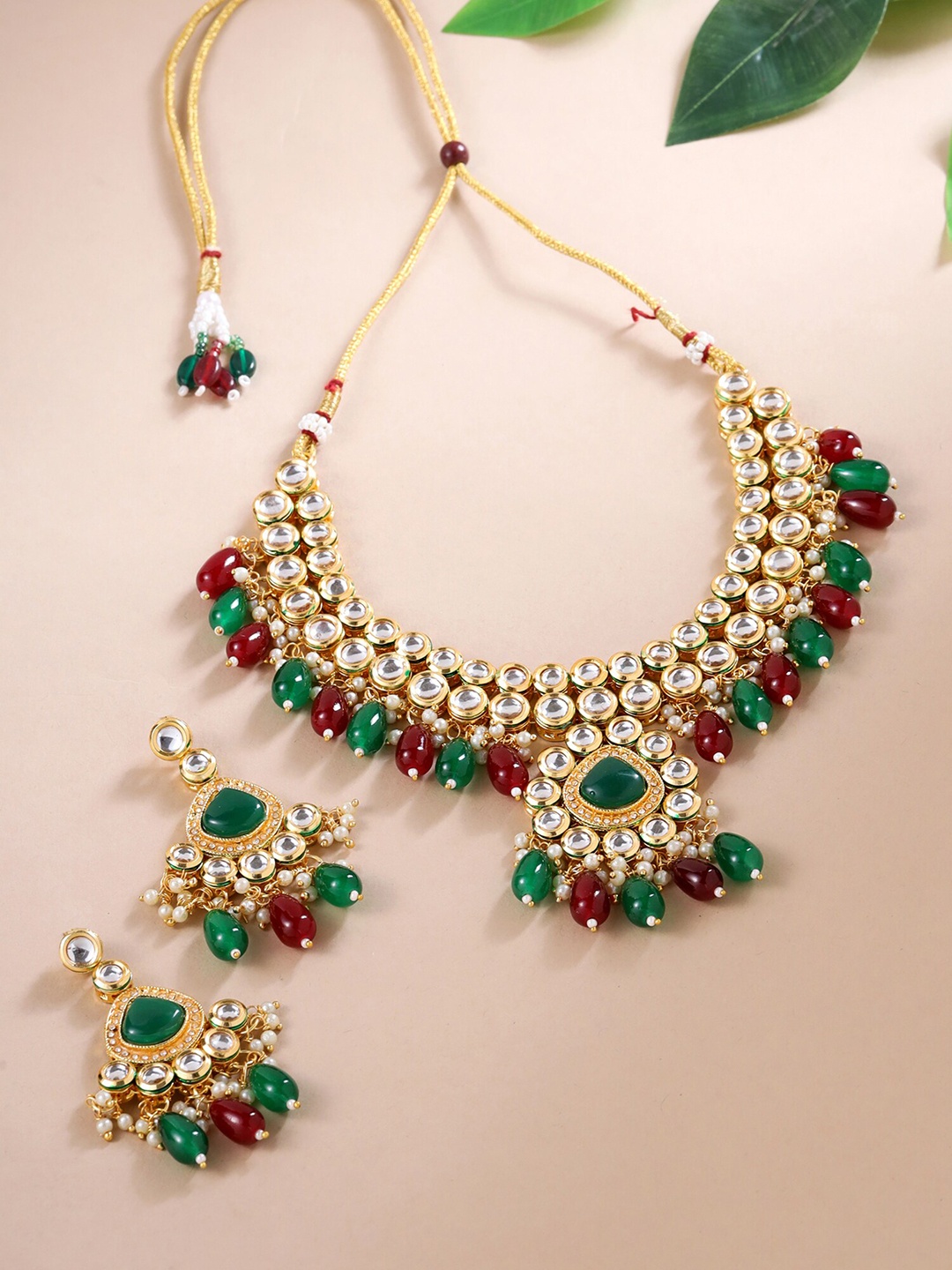 

Yellow Chimes Gold Plated Kundan-Studded Beaded Jewellery Set