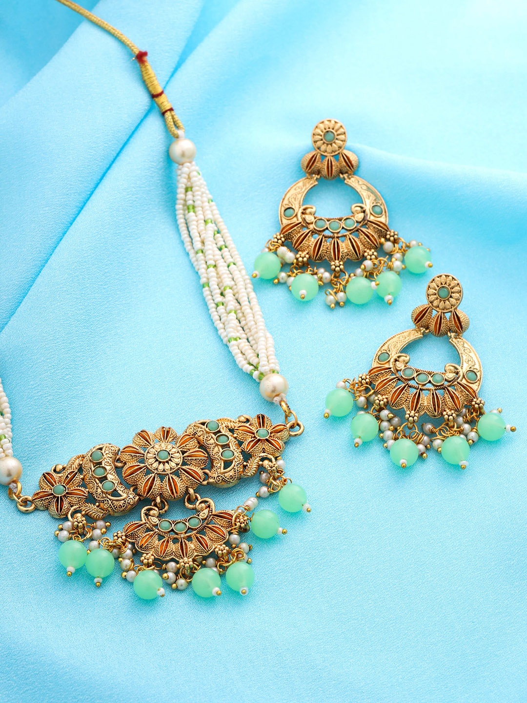 

Yellow Chimes Gold-Plated Stone-Studded & Pearl Beaded Jewellery Set