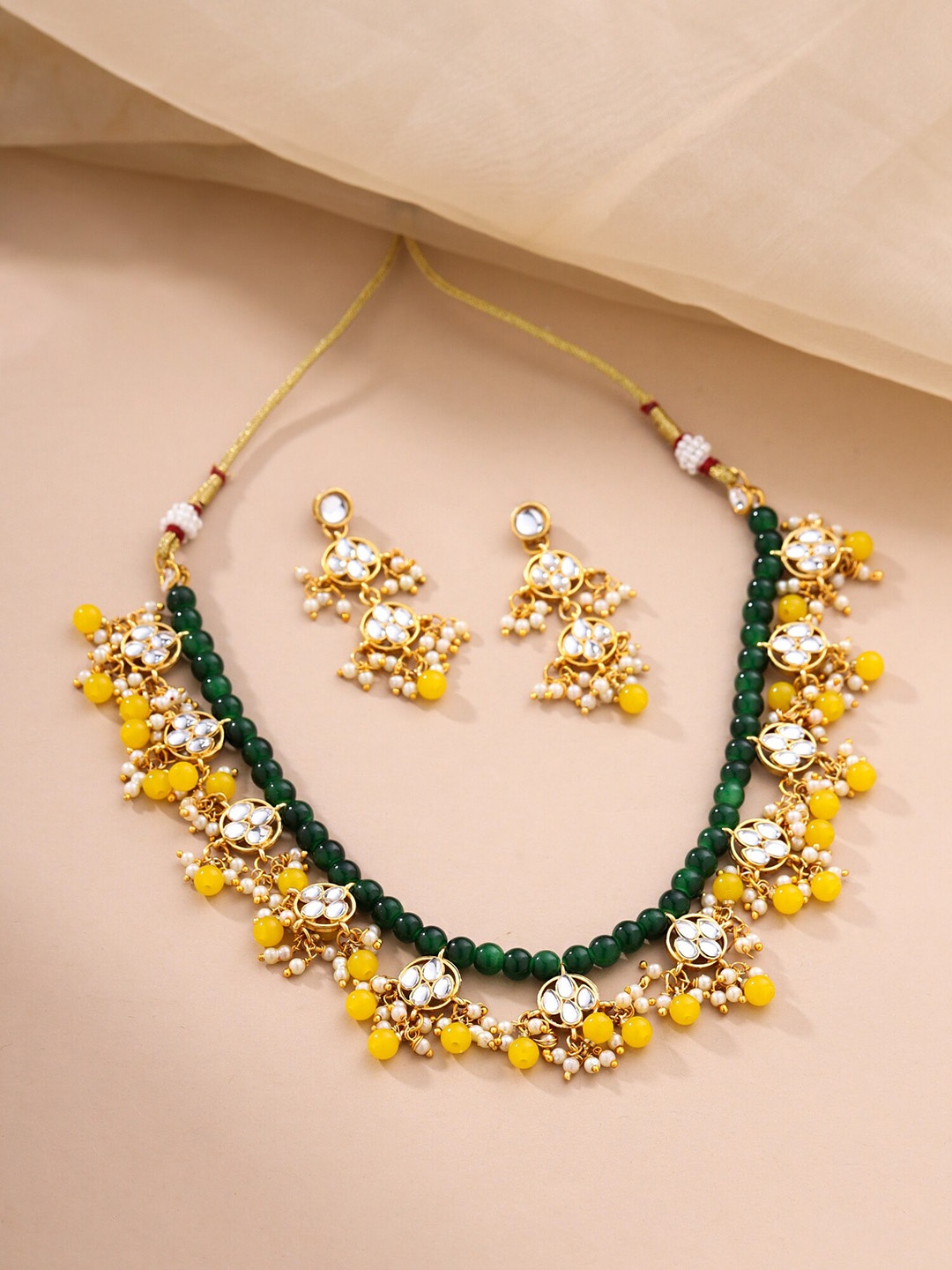 

Yellow Chimes Gold-Plated Stone-Studded & Pearl-Beaded Jewellery Set