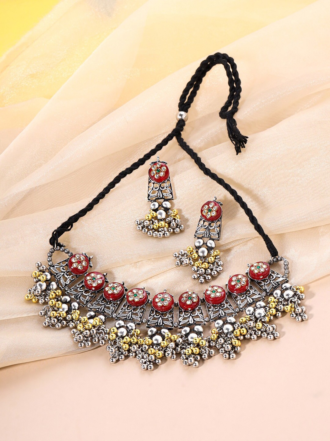 

Yellow Chimes Oxidised Ghungroo Studded Jewellery Set, Silver