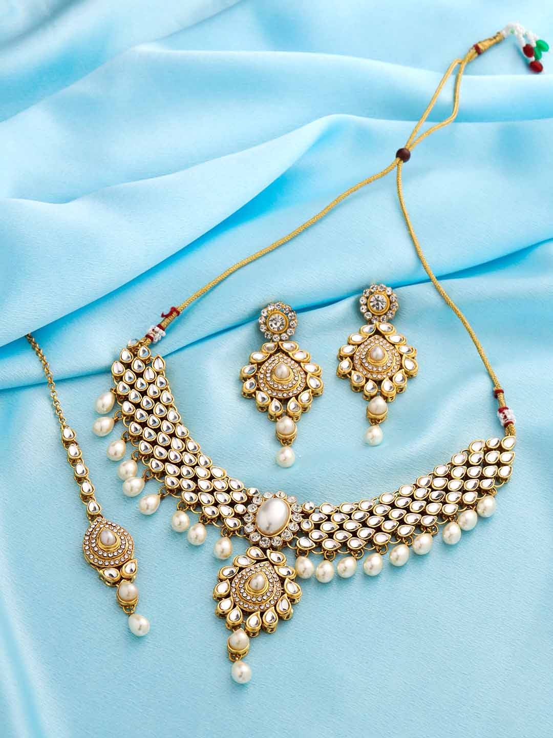 

Yellow Chimes Gold-Plated Kundan-Studded & Beaded Jewellery Set