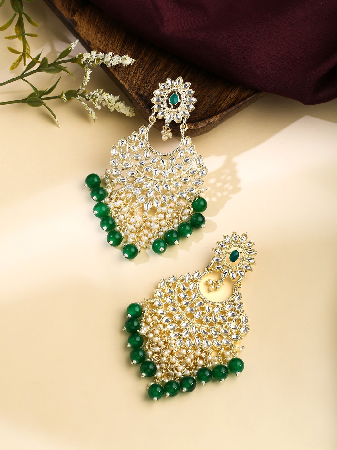 

Yellow Chimes Gold-Plated Kundan Studded Contemporary Chandbalis