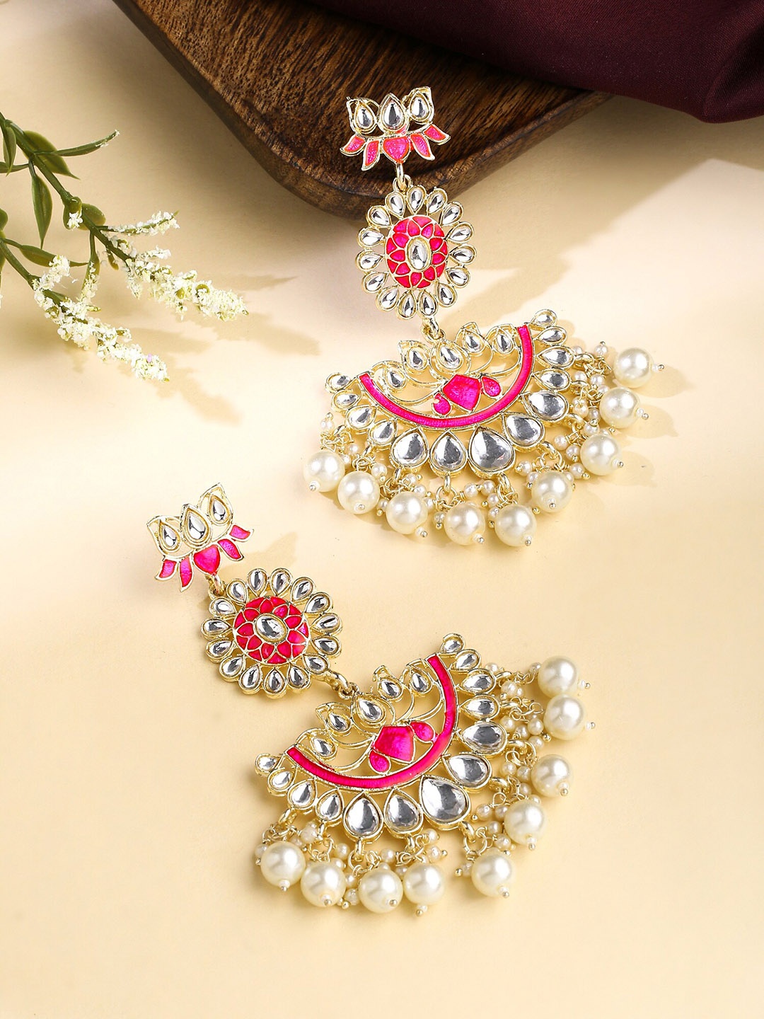 

Yellow Chimes Gold Plated Kundan Studded Contemporary Chandbalis