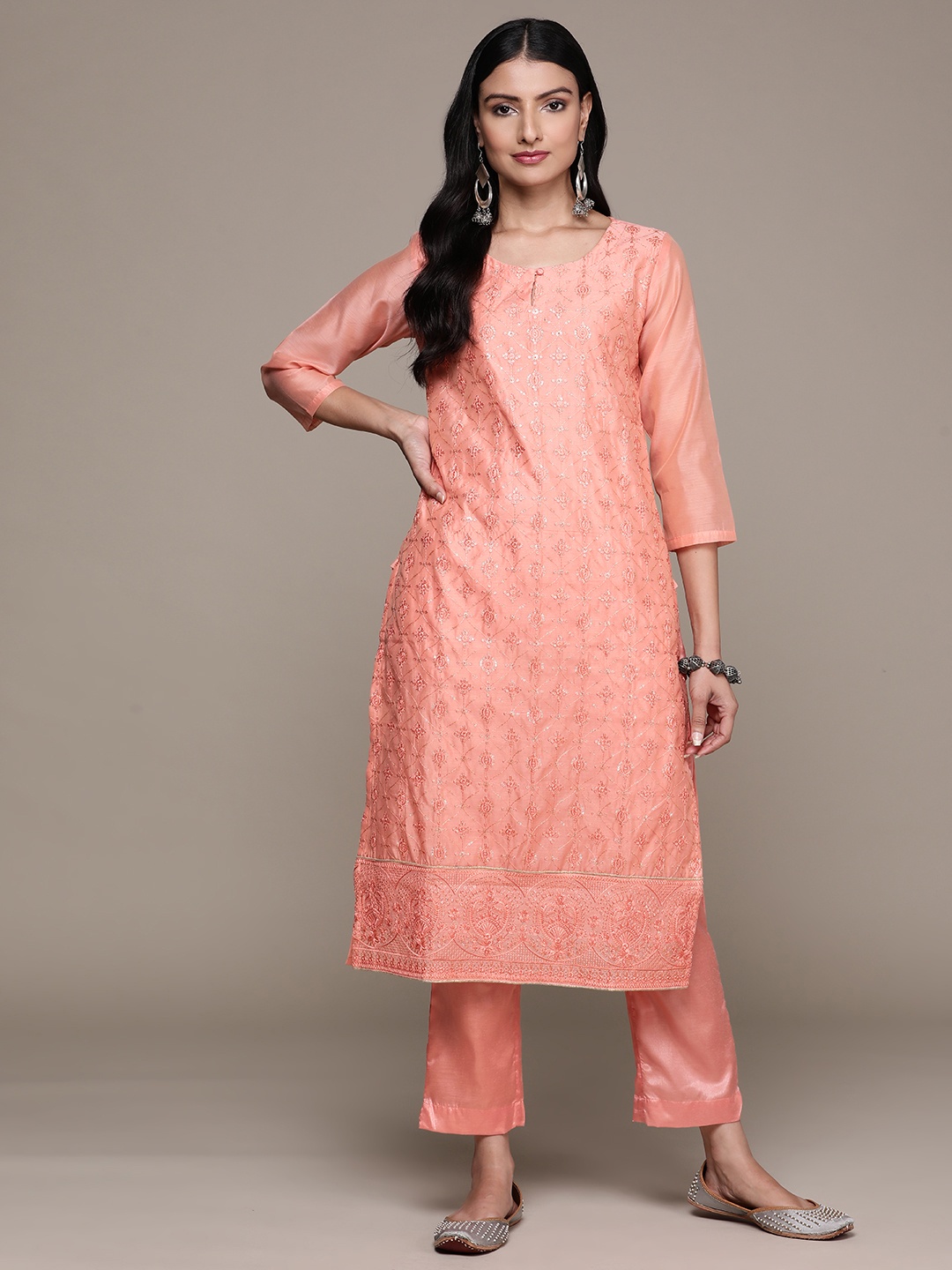 

Ishin Women Peach-Coloured Floral Regular Sequinned Chanderi Silk Kurta with Trousers & With Dupatta