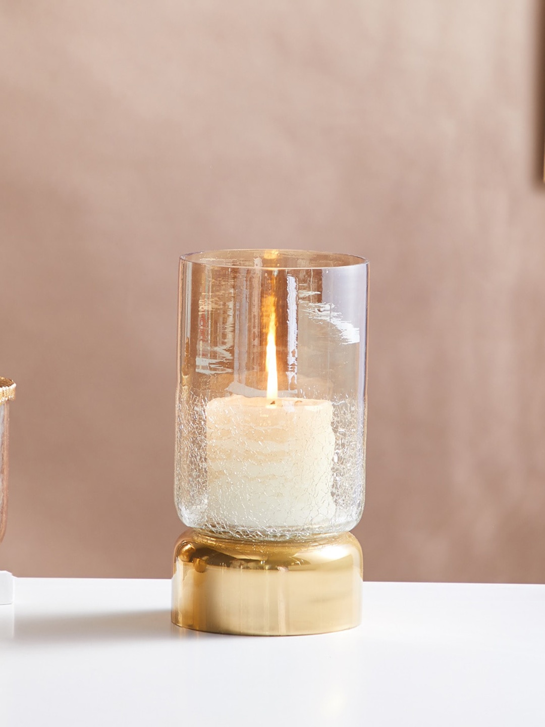 

Home Centre Gold-Toned Textured Hurricane Candle Holder