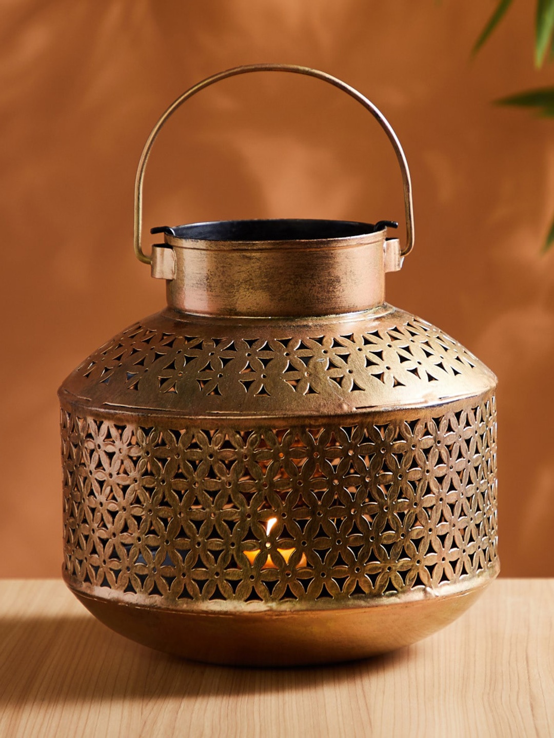 

Home Centre Gold-Toned Textured Metal Hanging T-Light Holder