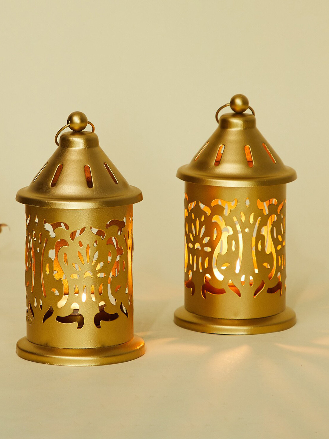 

Home Centre Gold-Toned 2 Pieces Textured Hanging T-Light Holders