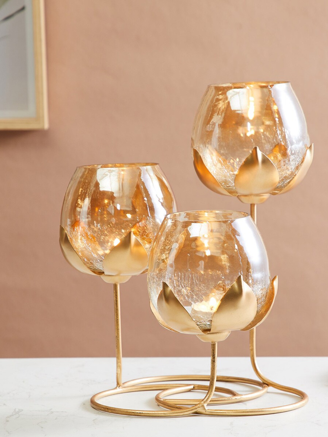 

Home Centre Corsica Kamal Gold-Toned 3 Pieces Textured Metal T-Light Holders