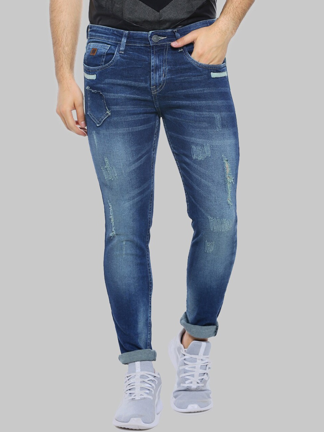 

Campus Sutra Men Blue Smart Light Fade Whiskers Cat Scratches Cotton Slim Fit Jeans