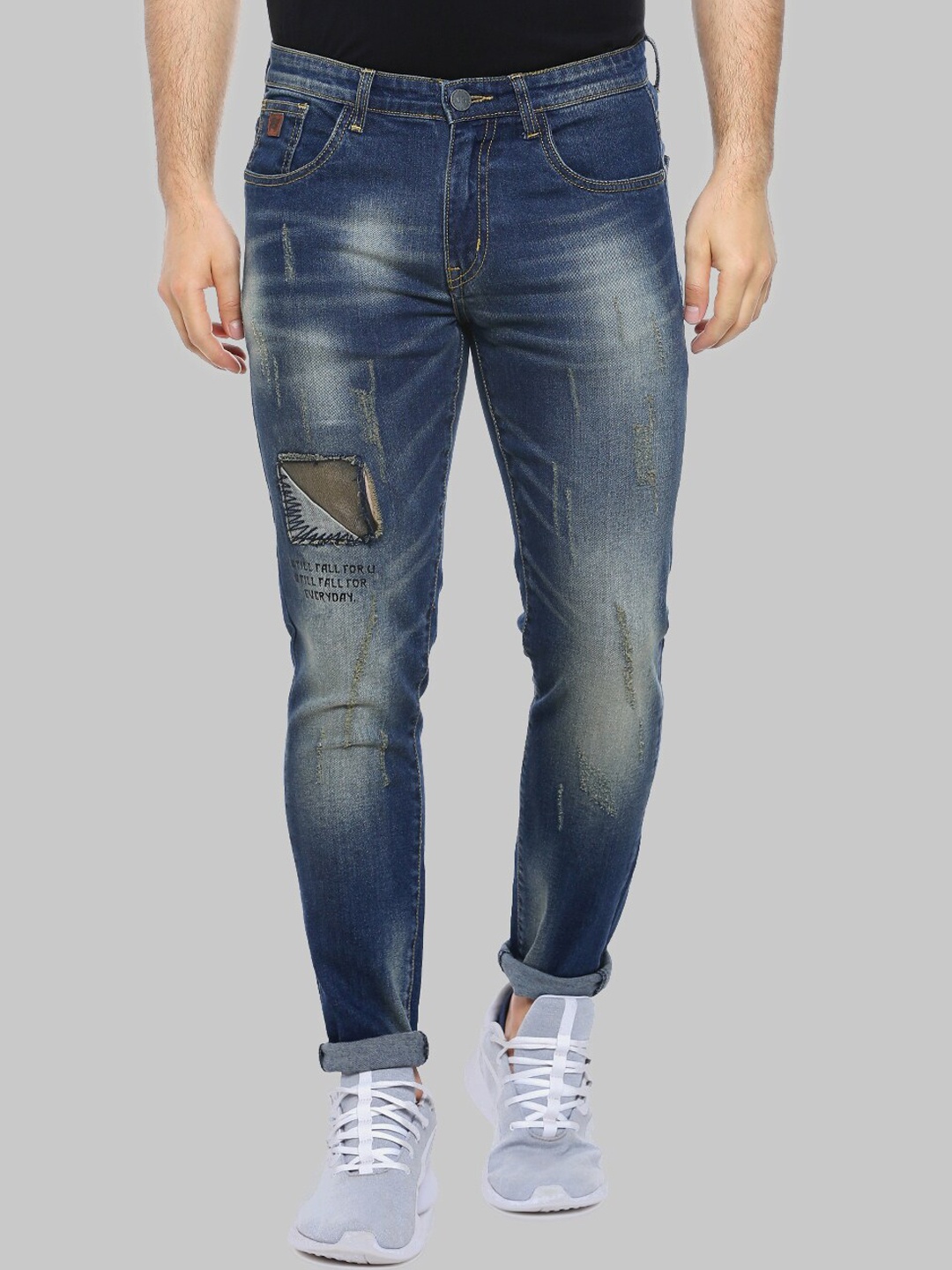 

Campus Sutra Men Blue Smart Slim Fit Mildly Distress Light Fade Stretchable Jeans
