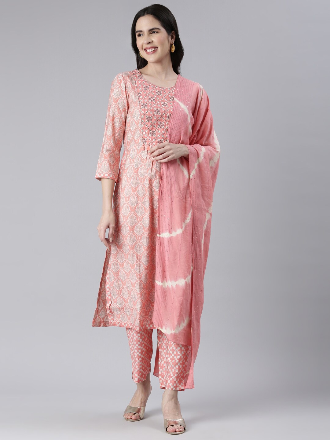 

Neerus Ethnic Motifs Printed Mirror Work Kurta with Trousers & With Dupatta, Coral