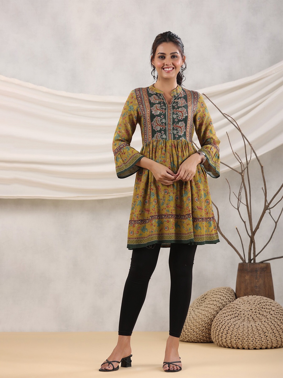 

Rain & Rainbow Ethnic Motifs Printed A-Line Kurti, Mustard