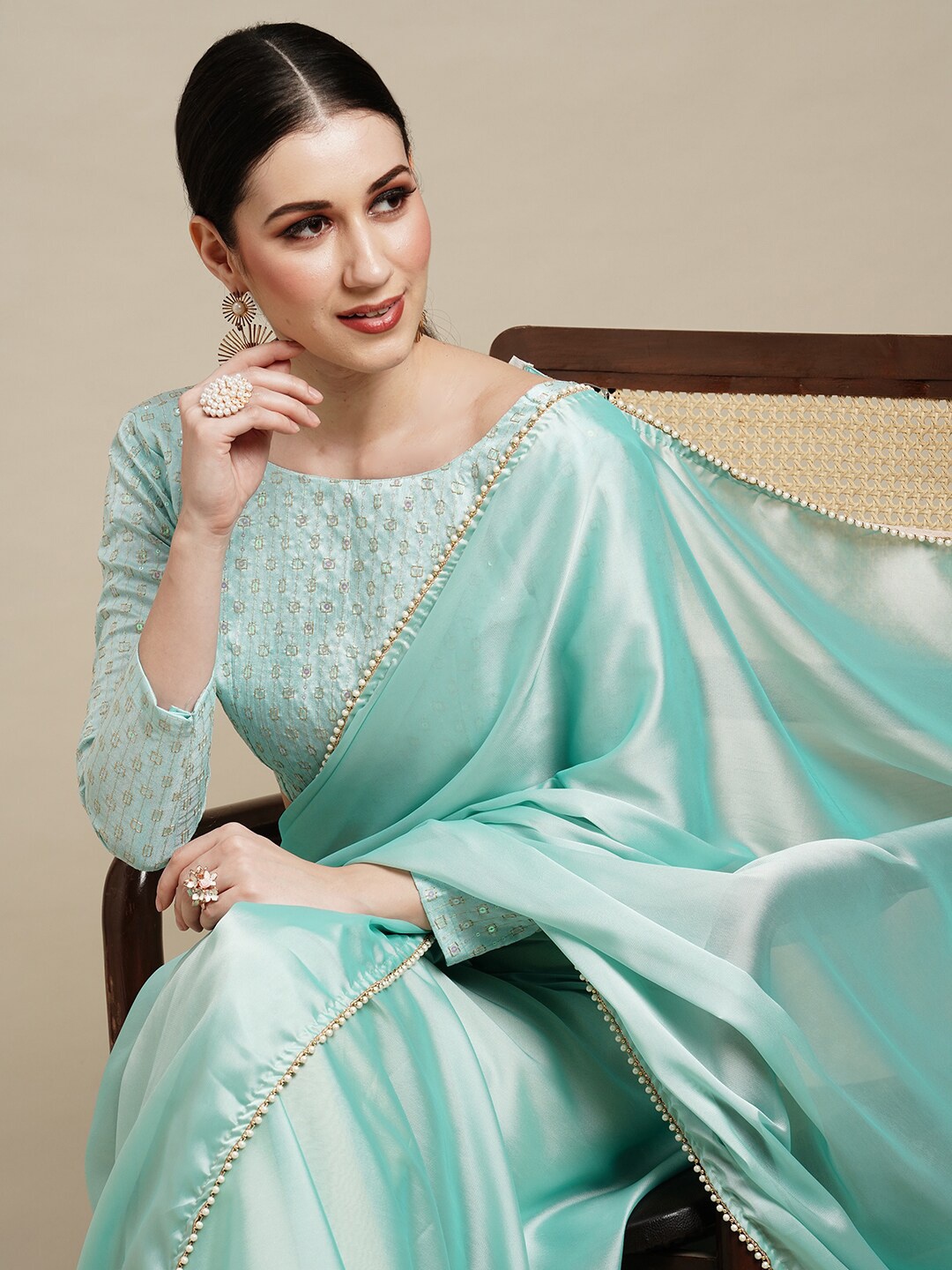 

Anouk Turquoise Blue & Gold-Toned Pure Georgette Saree