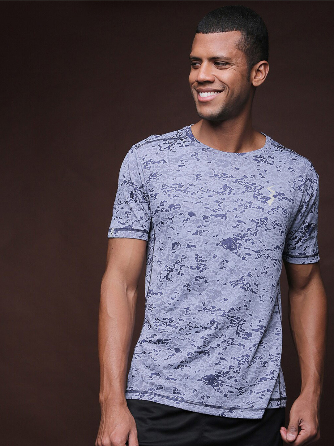 

Campus Sutra Blue Abstract Printed Dry-Fit T-shirt
