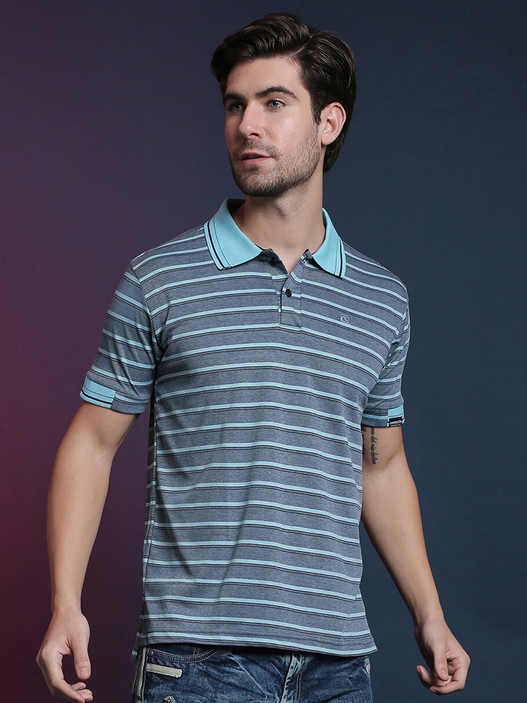 

Campus Sutra Blue Striped Polo Collar Casual T-shirt