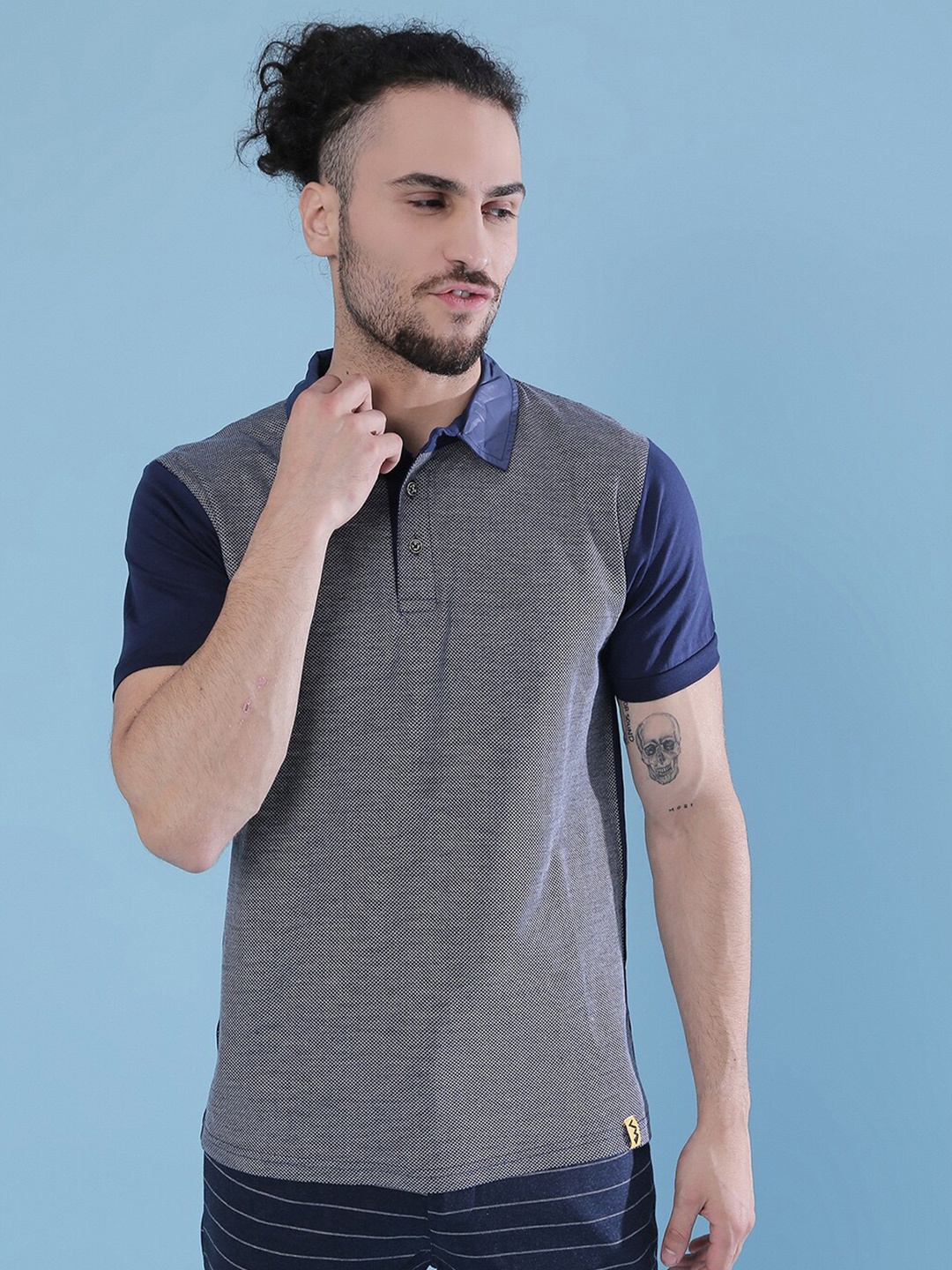 

Campus Sutra Navy Blue Polo Collar Casual T-shirt
