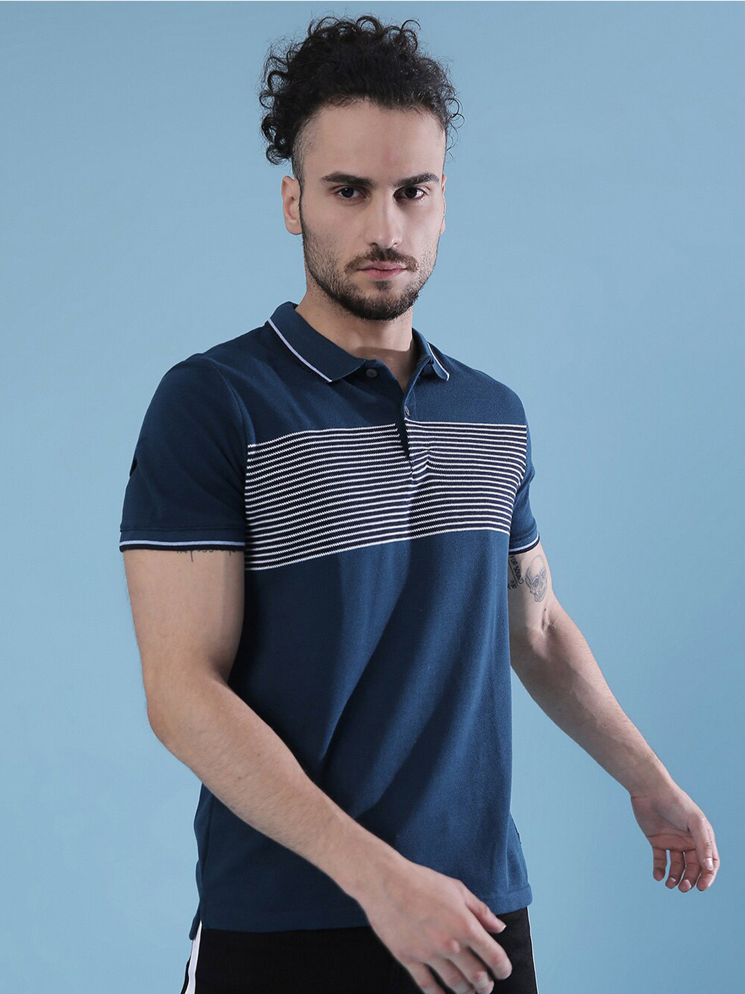

Campus Sutra Navy Blue Striped Polo Collar Short Sleeves Casual Cotton T-shirt