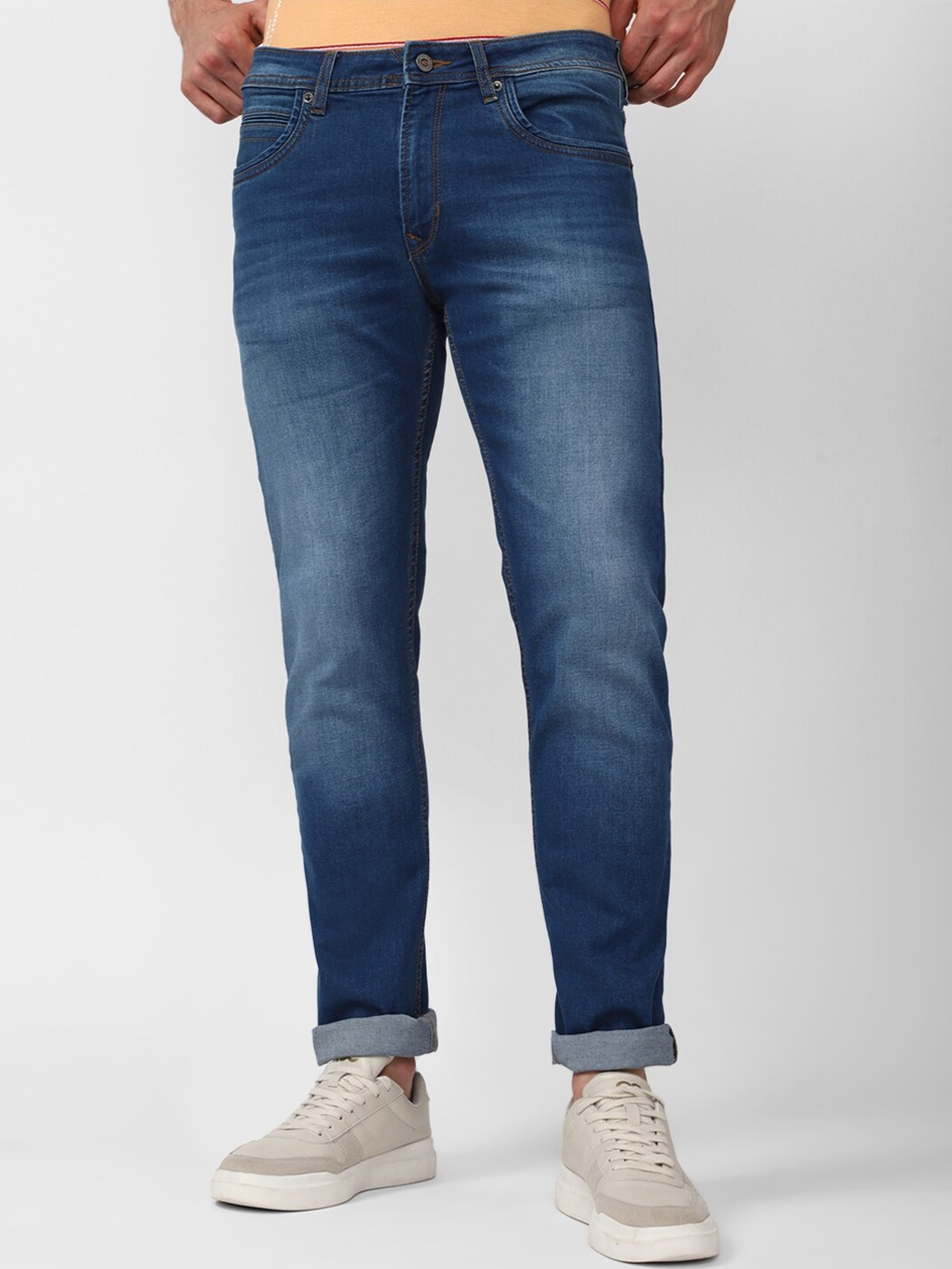 

Peter England Casuals Men Mid-Rise Tapered Fit Heavy Fade Jeans, Blue