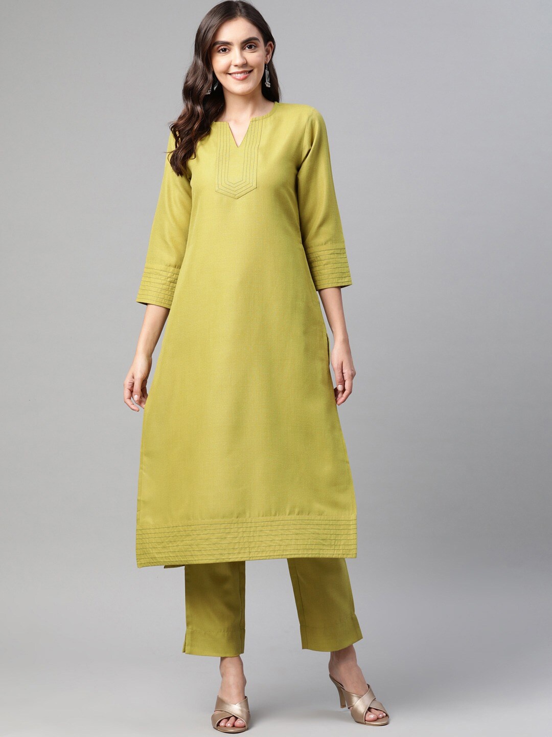 

Cottinfab Notched Neck Thread Work Kurta With Trousers, Yellow