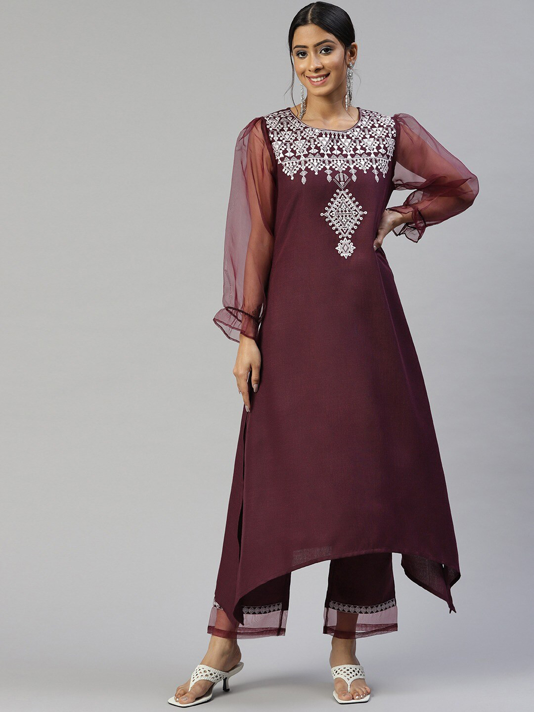 

Cottinfab Ethnic Motifs Embroidered Mirror Work A-Line Kurta with Palazzos, Burgundy