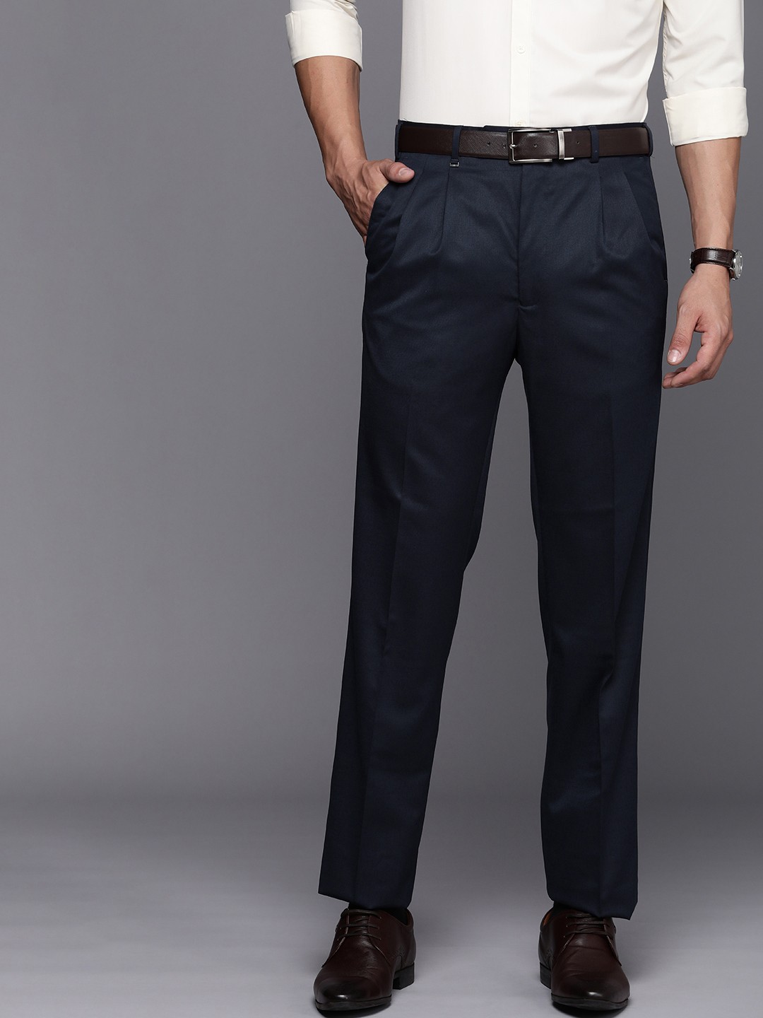 

Raymond Men Solid Classic Fit Double Pleated Formal Trousers, Blue