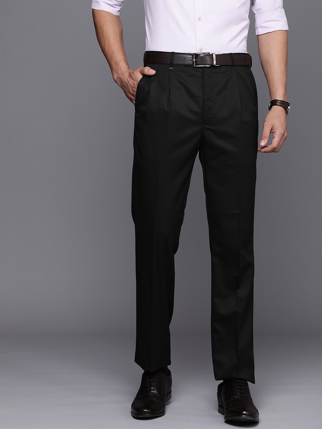

Raymond Men Solid Double Pleated Classic Fit Formal Trousers, Black