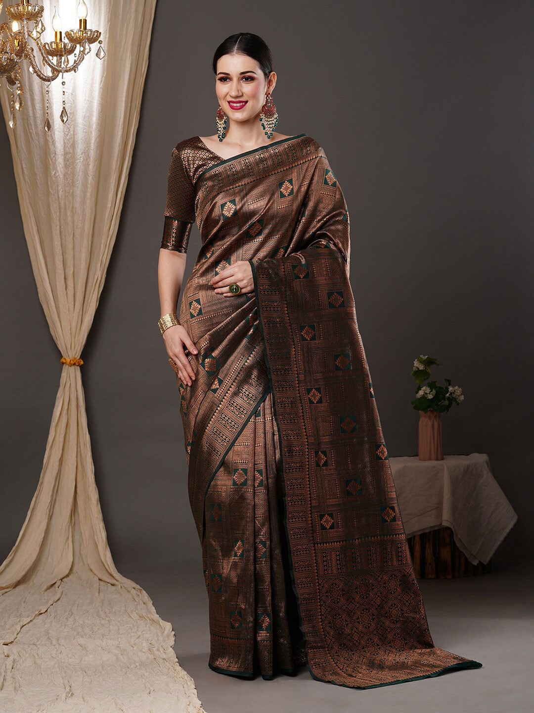 

Saree mall Green & Copper-Toned Ethnic Motif Woven Design Zari Kanjeevaram Sarees