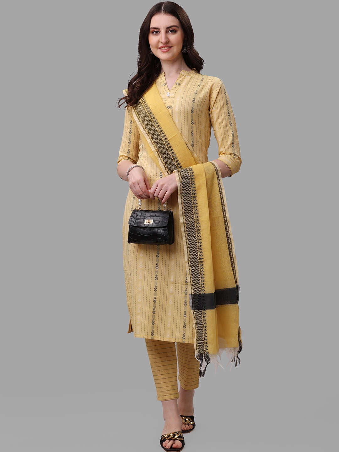 

Shiv Textiles Striped Pure Cotton Kurta With Trousers & Dupatta, Mustard