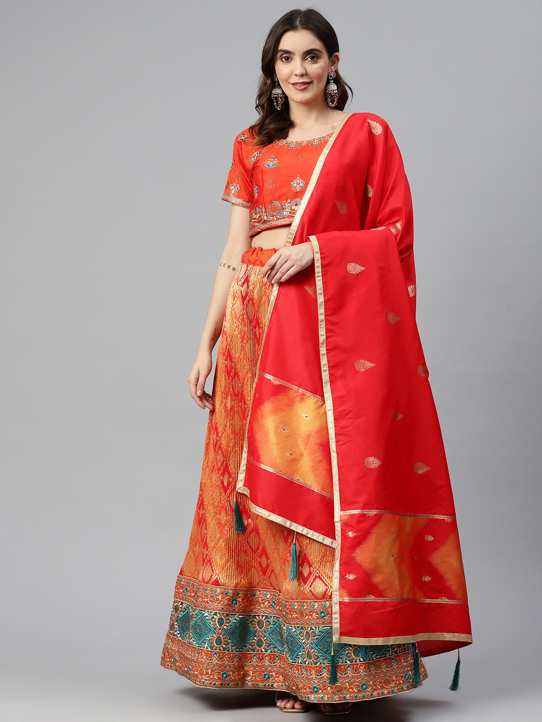 

CAMPAIGN TRENDS Orange Embellished Unstitched Lehenga & Blouse With Dupatta