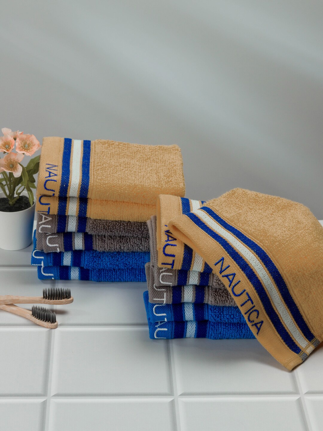 

Nautica Beige & Blue 12 Pieces 500 GSM Zero Twist Pure Cotton Face Towels