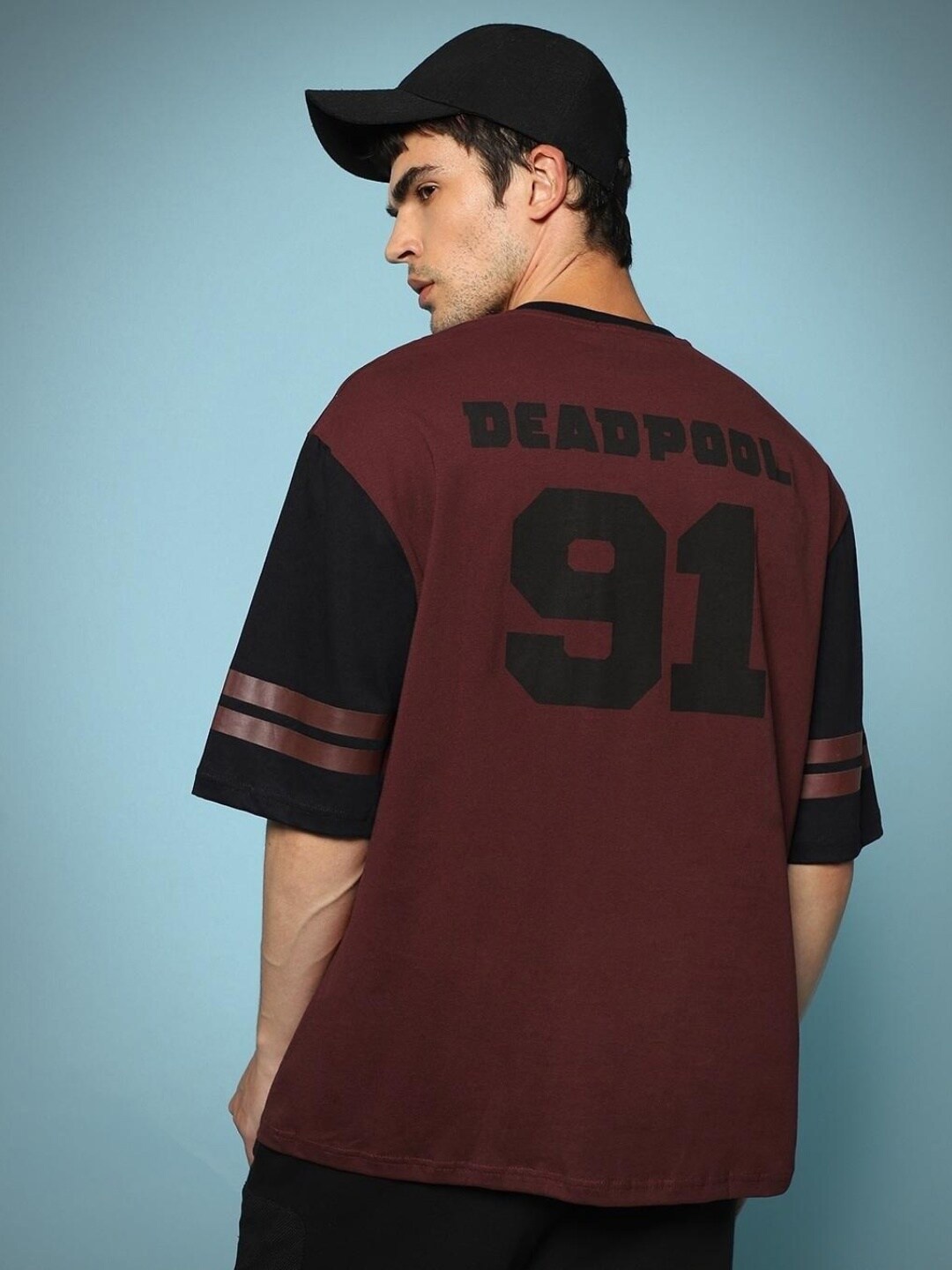 

Bewakoof Plus Men Deadpool Printed Drop Shoulder Sleeves Loose Fit T-shirt, Maroon