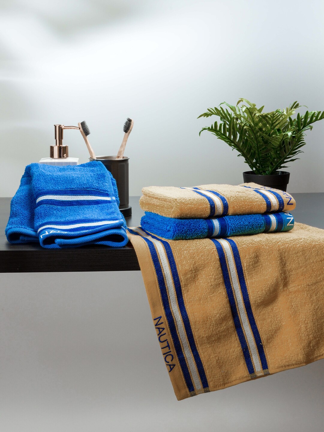 

Nautica Beige & Blue 4 Pieces 500 GSM Zero Twist Pure Cotton Hand Towels