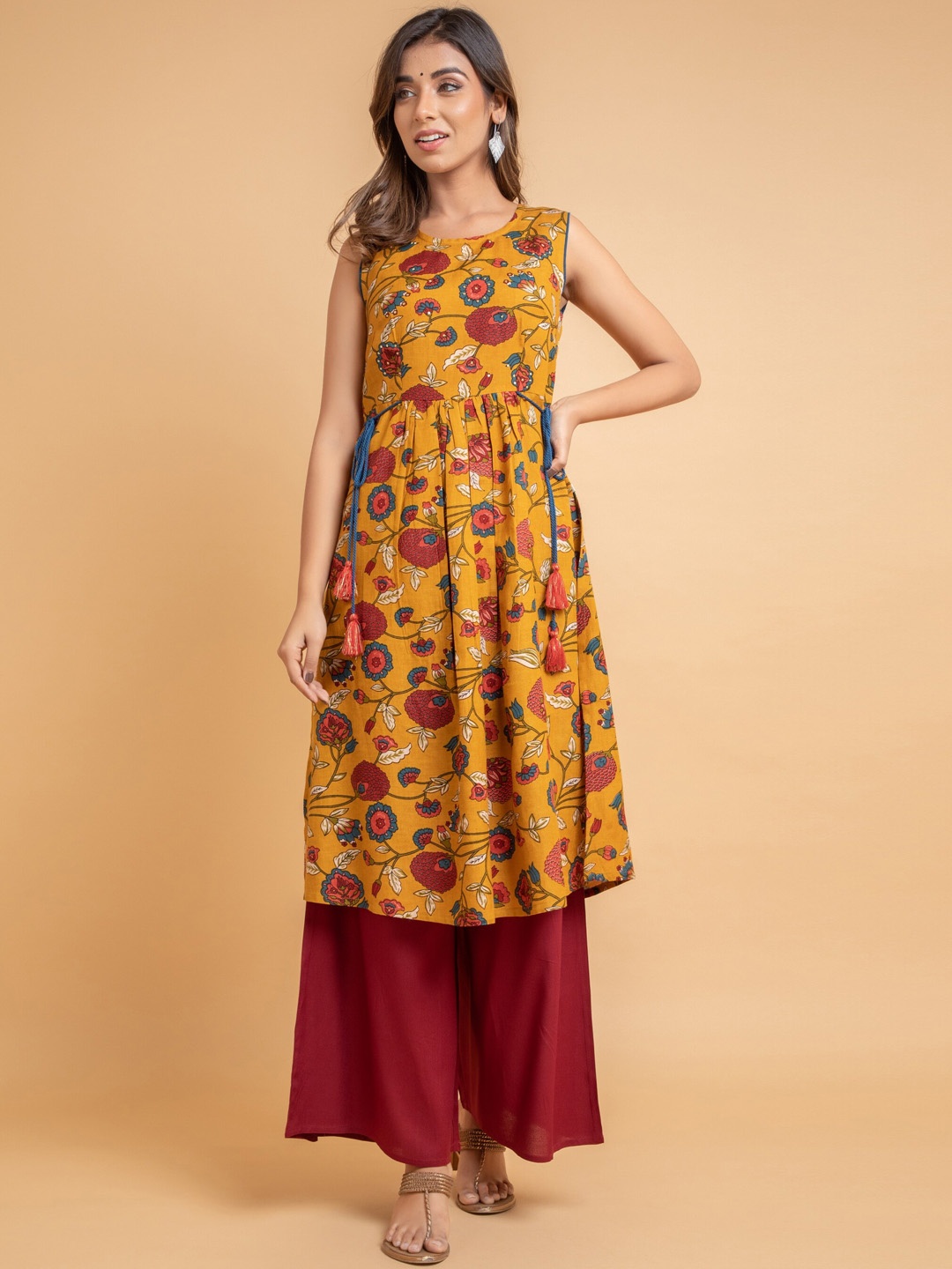 

SUTI Floral Printed Sleeveless A-Line Kurta, Mustard