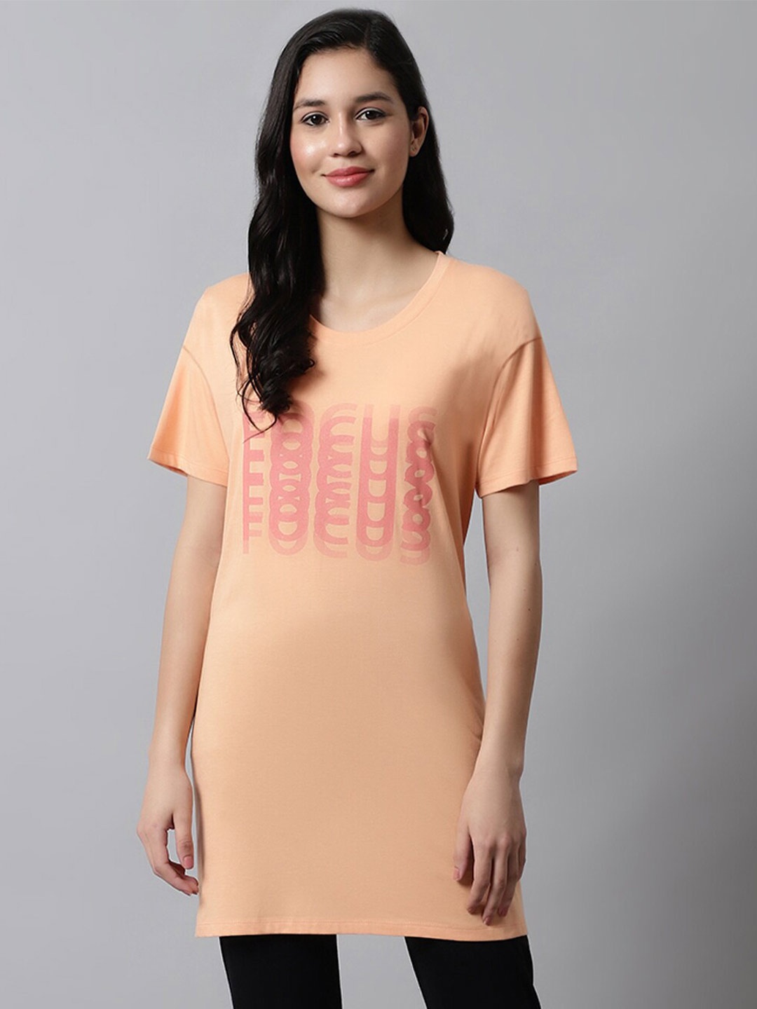 

Kanvin Orange Typography Printed Oversized Longline T-shirt